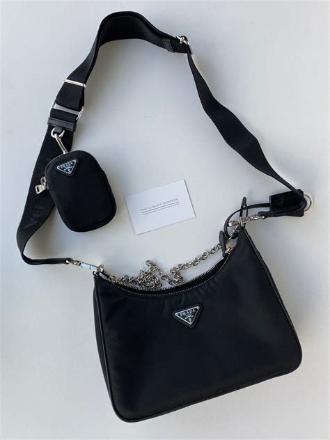 prada nylon cross-body bag with pouch|Prada padded nylon shoulder bag.